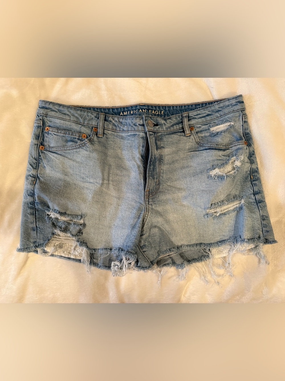 American Eagle ripped blue jean shorts